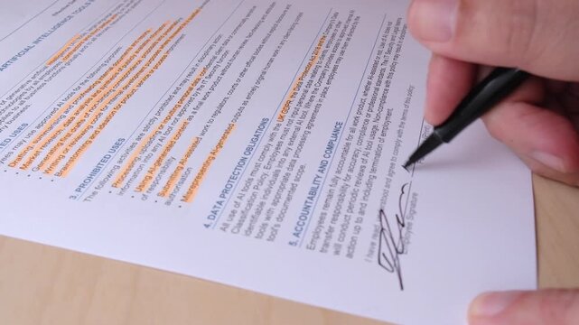 Corporate intellectual property contract is signed and dated by IT mgr