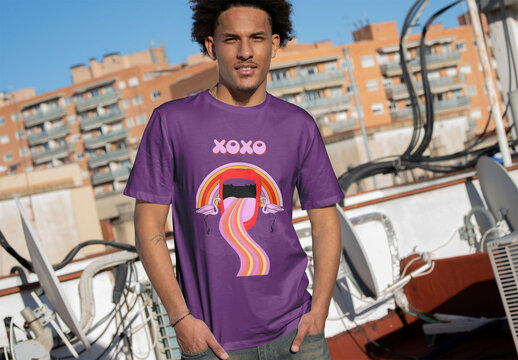 Mockup Template of Male Wearing Short-Sleeved T-Shirt on Rooftop. Front Design.