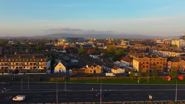 Morning light highlights Dublin's residential area with Aviva Stadium visible. Perfect for real estate or urban development projects.
