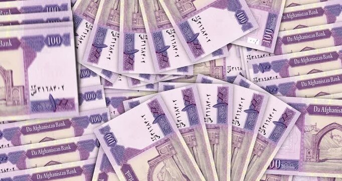 Afghanistan Afghani Afghan money banknotes in a cash fan mosaic pattern loop. 100 AFN notes. Abstract concept of bank, finance, economy seamless and looped design background.
