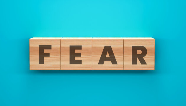 Fear in Blocks: A conceptual depiction of the emotion fear, spelled out using wooden blocks, suggesting a tangible and structural understanding of anxiety and apprehension. 