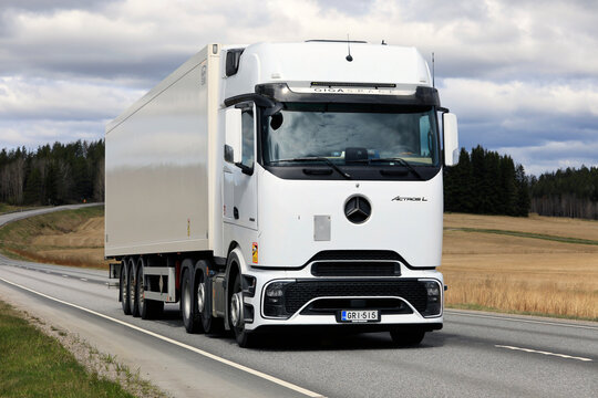 Road transport by new white Mercedes-Benz Actros L 2551 Procabin truck semi trailer. 
