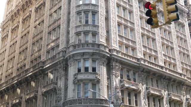New York City Manhattan Midtown historic building 1909, facade architecture, United States of America. Real estate property on 7 seventh avenue. Classic style design landmark. Corner symmetry, windows