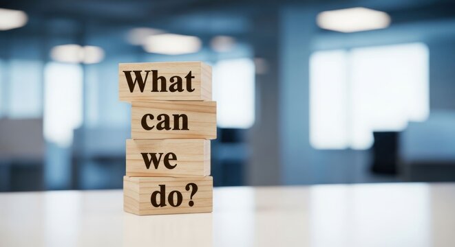 What Can We Do Question on Wooden Blocks in Office Setting.