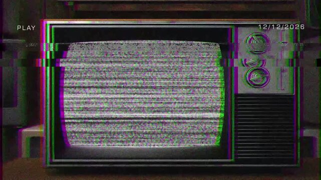 Close-up of an old-fashioned television displaying static noise, featuring classic analog knobs and a retro aesthetic. Ideal for themes of nostalgia, technology evolution, retro design, or digital dis