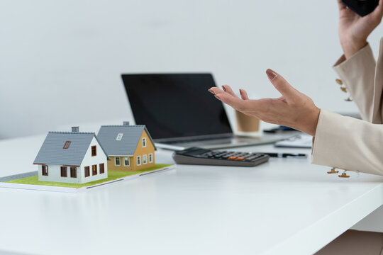 Frustrated Asian Female Real Estate Agent Arguing on Phone