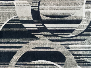 Naklejka premium Random abstract monochrome carpet flooring suitable for hotel and high end floor finishes, in beige and black pattern. Seamless texture.