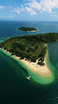 Gili Nanggu Pristine White Sand Beach and Vibrant Coral Reef Lagoon in South Lombok