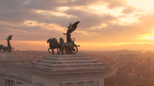 Vittoriano during sunrise time with light behind the Angel - 4K