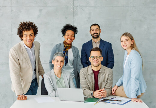 Group portrait of young happy businesspeople team in the office