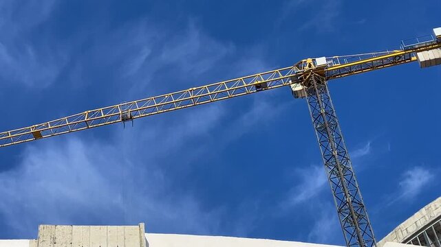 construction site with crane and blue sky