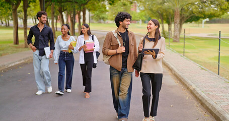 Indian young adult gen z busy boy girl use tab look screen talk share new online e learning study...