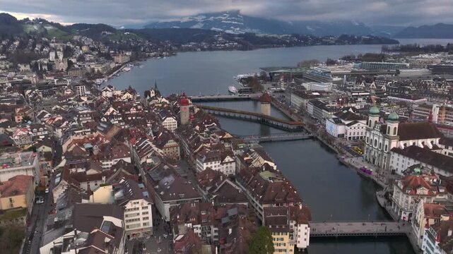 Lucerne City in Switzerland at Winter Time, Aerial Drone Shot of Old Town with Kapellbruecke and Wasserturm Luzern.