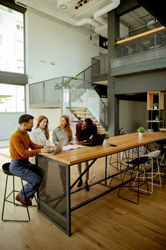 Group of people working together in an office space during the day