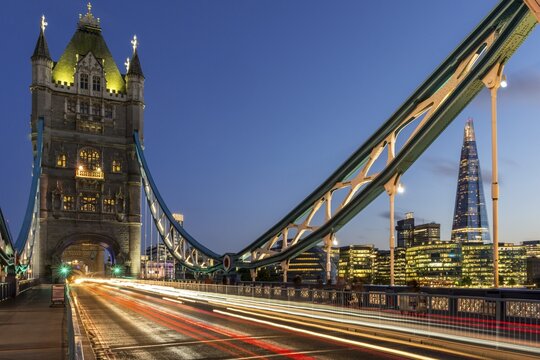 Tower Bridge in the evening, light tracks of passing cars, London, England, Great Britain