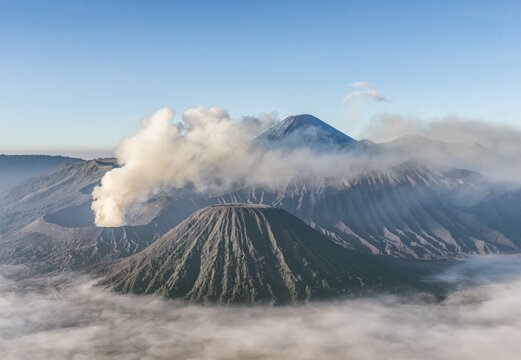 Mount Bromo smoking volcano, Mount Batok, Mount Kursi, Mount Gunung Semeru, Bromo Tengger Semeru National Park, East Java, Indonesia