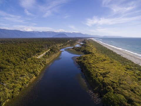Aerial View, Beach and Coast View, moderate rainforest and lake, Southern Alps, Ship Creek, Haast, West Coast, New Zealand