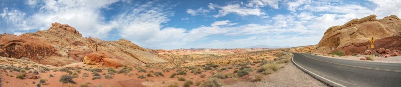 Road between red sandstone formations, Valley of Fire, Mojave Desert, Nevada, USA