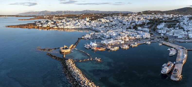 Evening atmosphere, aerial view, town view and harbour of Naoussa, harbour wall with Venetian ruins, Paros, Cyclades, Greece