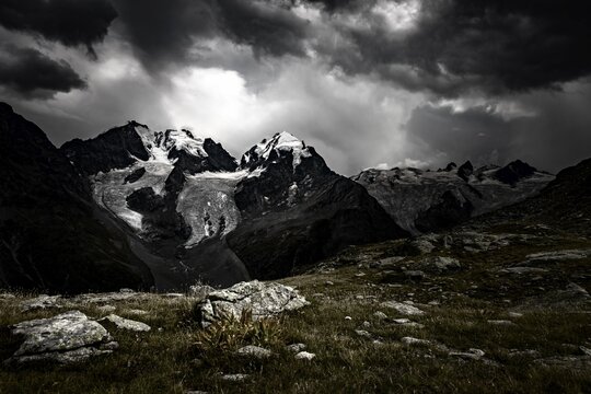 Summit of the Bernina Group with dramatic clouds, St Moritz, Engadin, Grisons, Switzerland