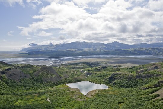 Hilly landscape with a small lake, Hvannagil, Iceland