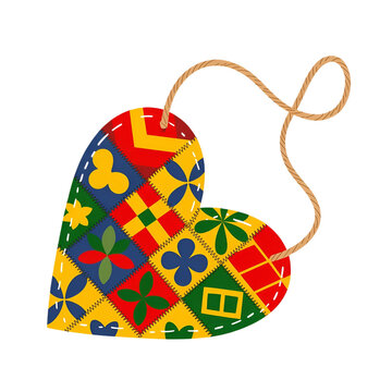 A Colorful Patchwork Heart Decoration with a String.