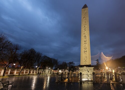 Illuminated Egyptian obelisk on the Hippodrome in the evening, also Sultanahmet Squarean part, Istanbul, Turkey