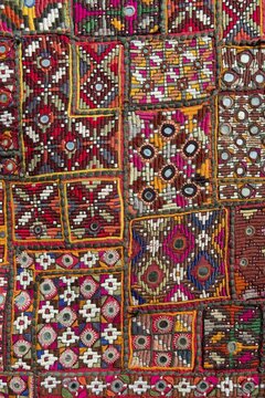 Traditional wall hanging from Rajasthan, colourful, inlaid with mirrors and different patterns, detail, Udaipur, Rajasthan, India