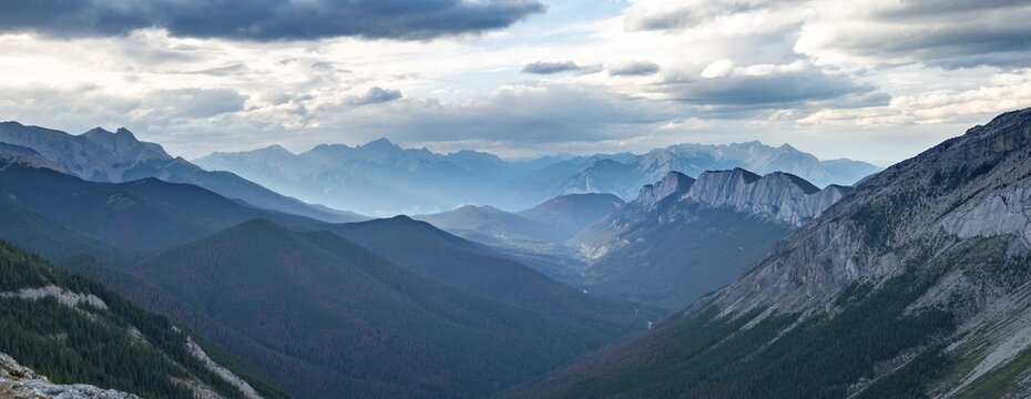 View into forested valley, mountain peak and Ashlar Ridge in the back, Sulphur Skyline Trail, Jasper National Park, Alberta, Canada