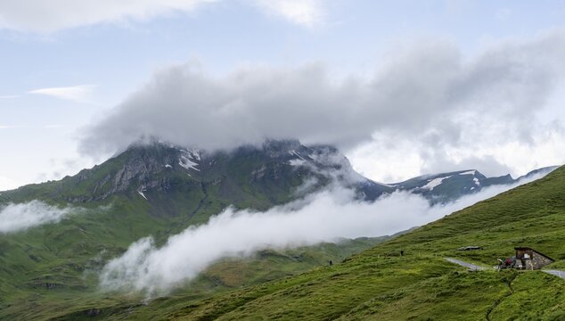 Clouds move around mountain peaks, Grindelwald First, Bernese Alps, Bernese Oberland, Switzerland