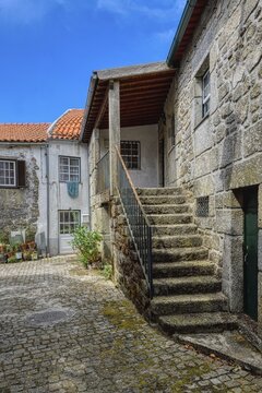 Narrow cobble street and old stone houses, Trancoso, Serra da Estrela, Portugal