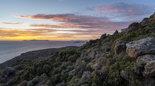 Sunset over the sea, landscape with macchia, in the back islands Gyali and Kos, Nisyros, Dodecanese, Greece