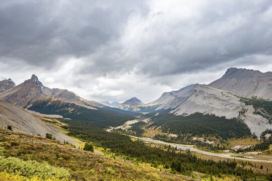 View into the valley with Icelfields Parkway, view of mountain landscape and glaciers in autumn, mountains Hilda Peak and Nigel Peak, Jasper National Park National Park, Canadian Rocky Mountains, Alberta, Canada