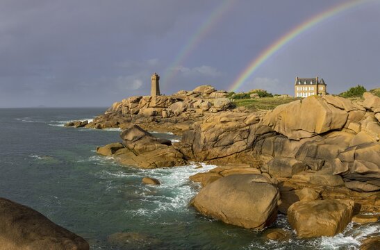 Phare de Men Ruz and Villa of Gustave Eiffel with double rainbow, Ploumanac'h, D&eacute;partement C&ocirc;tes-d'Armor, France