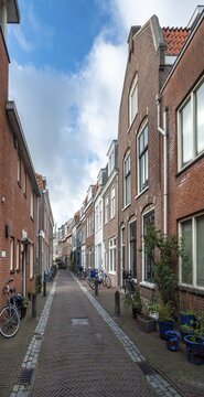 Small street with typical brick houses, Haarlem, Province of North Holland, Holland, Netherlands