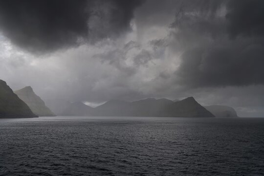 Low clouds, Dj&uacute;pini, Eysturoy, North coast Faroe Islands, Denmark