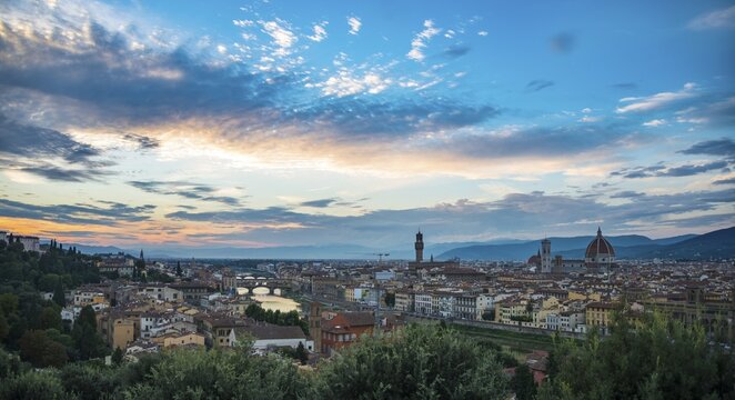 Cityscape at sunset with Cathedral, palace Palazzo Vecchio and bridge Ponte Vecchio, Florence, Tuscany, Italy