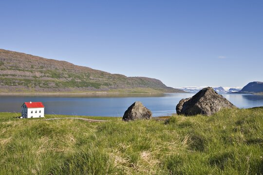 Lonely house on a fjord, Westfjords, Iceland, Atlantic Ocean