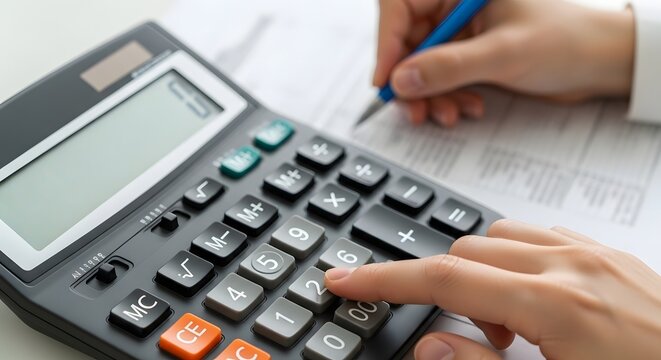 Close-up of a person using a black calculator to compute financial figures on a document, holding a blue pen to make notes, focusing on accounting, bookkeeping, and detailed data analysis tasks