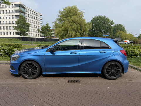 Almere, the Netherlands - May 4, 2026: Blue Mercedes-Benz A-Klasse, 3e generation, parked on a public parking lot. Nobody in the vehicle.
