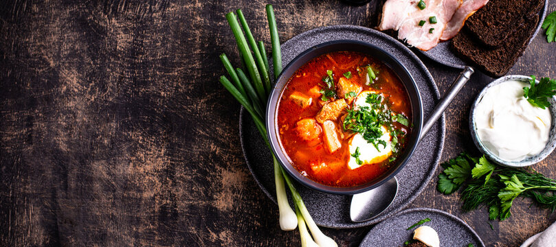 Traditional Ukrainian borsch with sour cream