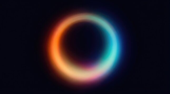 Abstract glowing circular light ring with a soft gradient of orange, yellow, and blue colors on a dark black background