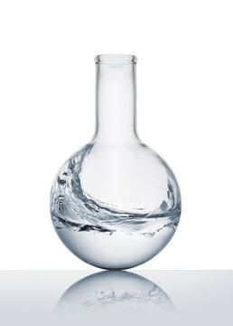 Water wave inside lab flask. Laboratory equipment with moving liquid