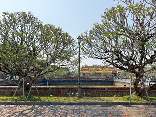 Imperial Palace of Hue, the last emperor dynasty residential palace in Vietnam. The complex is huge with river and mansions, influenced by Chinese heritage. Famous tourist destination © TMR Studio