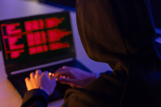 hacker  try to break through the security  with coding on the screen