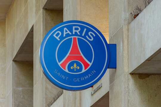 Emblem of football club Paris Saint-Germain at official store on Champs Elysees, France