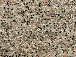 Close up of pebbledash or pea gravel cement with colorful gravels. Suitable for outdoor garden flooring or pavement sidewalk floor finishes. Seamless background texture.  © TMR Studio
