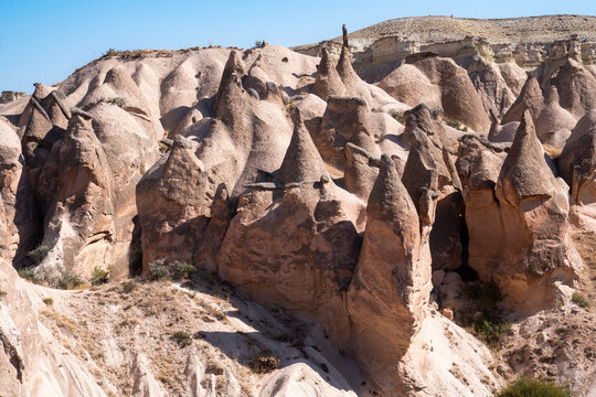 fairy chimneys on a hill in Cappadocia during an August day in the Devrent Valley in Cappadocia during an August day