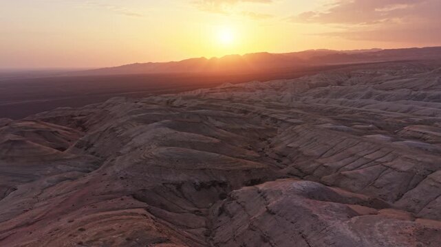 Vivid colorful layered sedimentary mountain with striped geological pattern in Altyn Emel, Kazakhstan