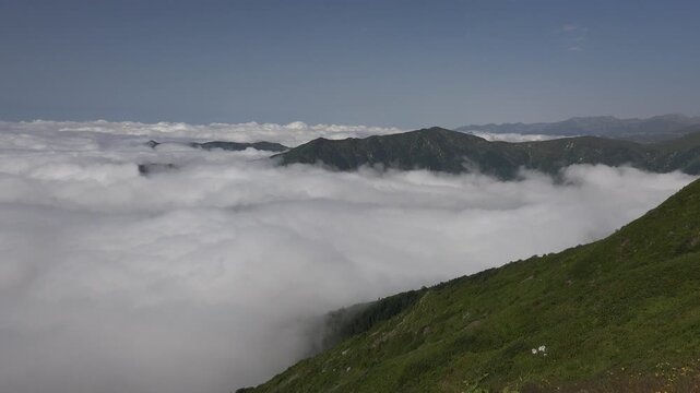 Time lapse of treeless high altitude meadows rising above clouds in Kackar Mountains. Alpine grasslands and mist layers define rugged Black Sea region peaks in northeastern Turkey.